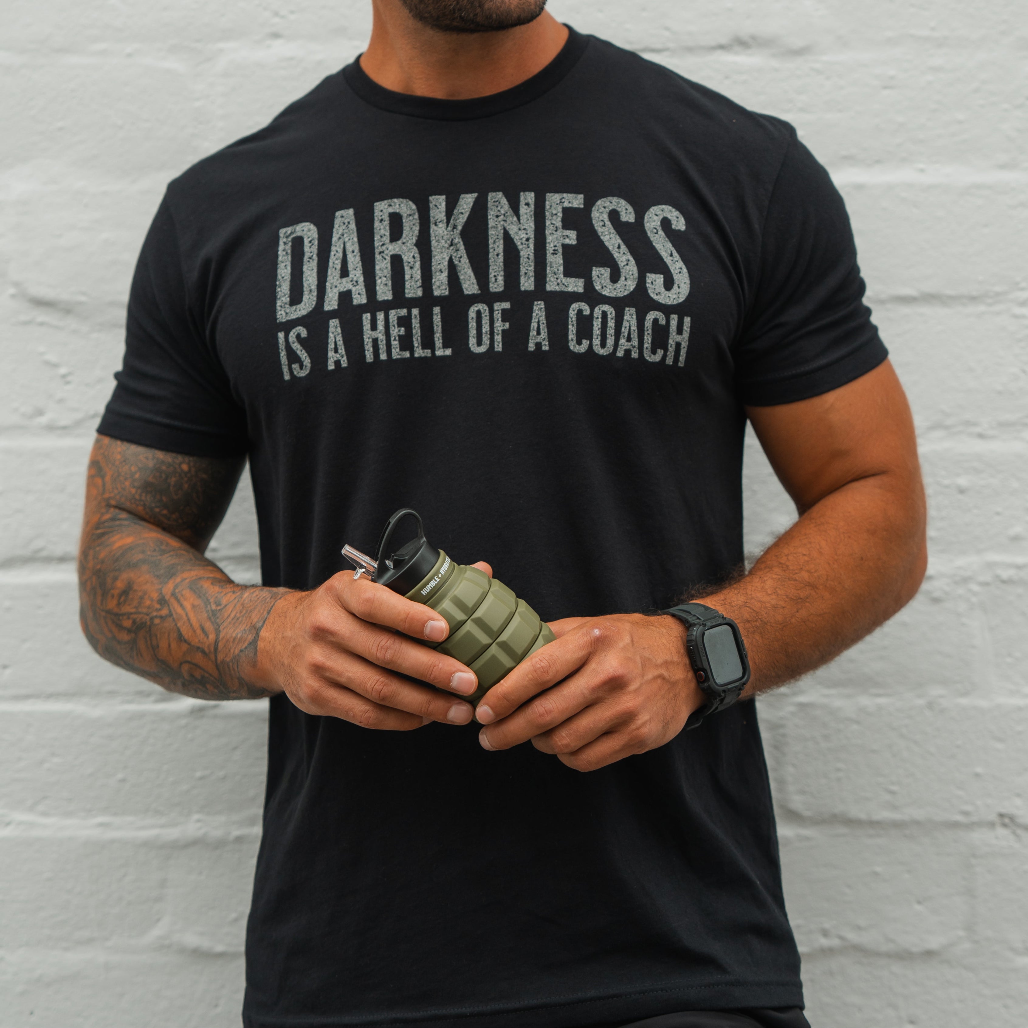 Darkness is a HELL of a Coach - Tee